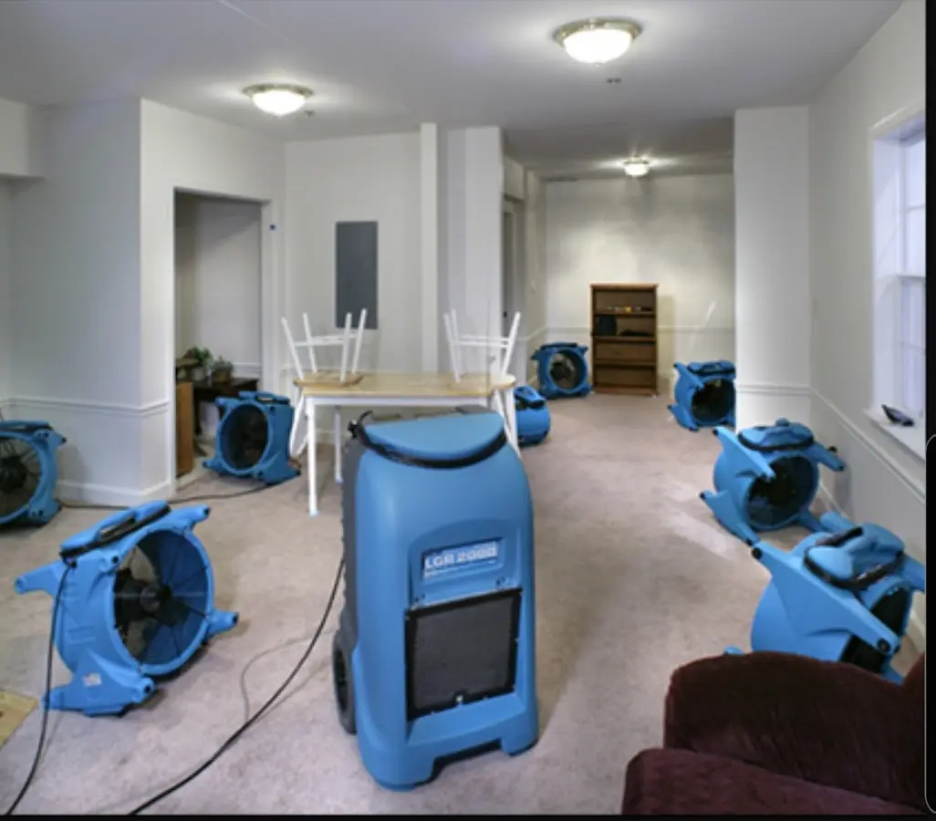 Air movers and dehumidifier setup for Water Extraction & Removal in Burley